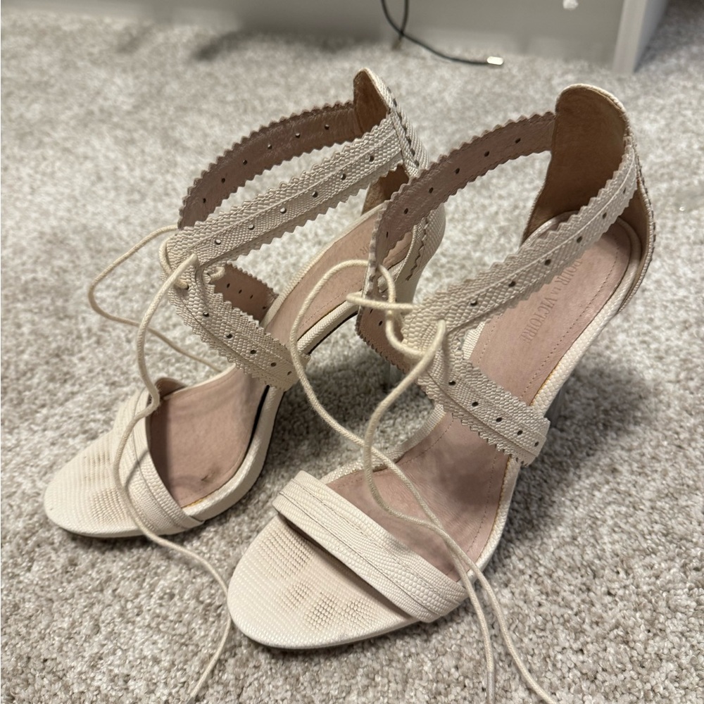 Pour La Victoire Cream Snake High Heel Sandals With Crisscross Straps